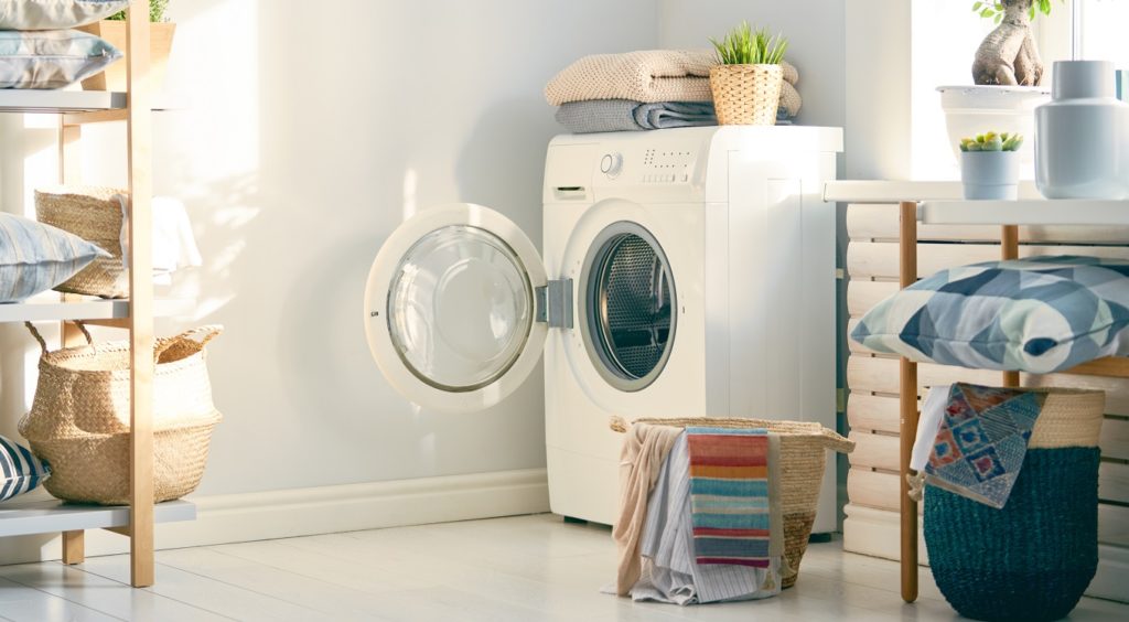 laundry room with a washing machine